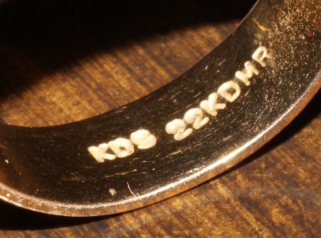 numbers stamped inside gold jewelry